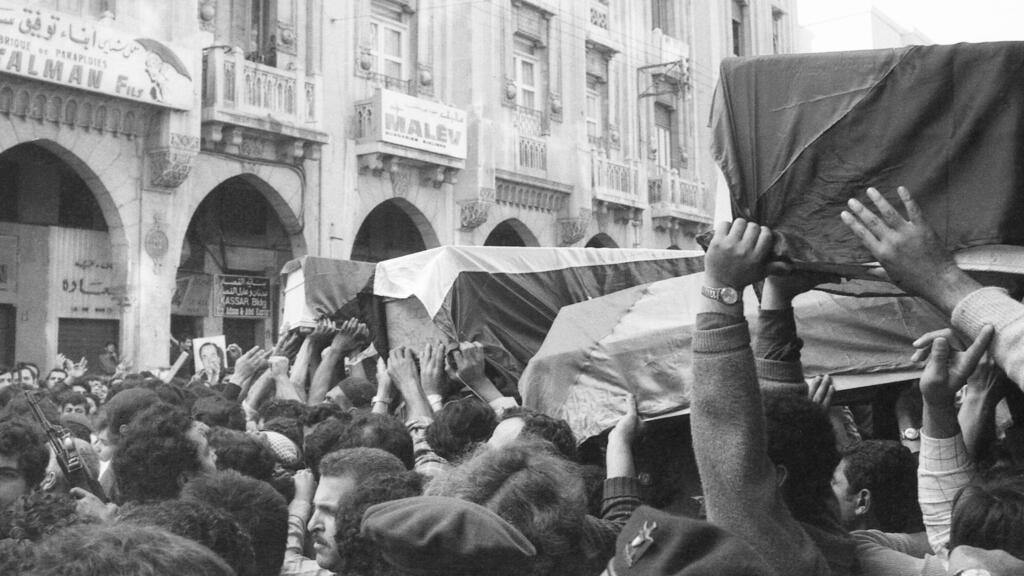 Flag draped coffins of slain Palestinians killed in Israeli raid are taken through the streets of Beirut, Lebanon on April 12, 1973