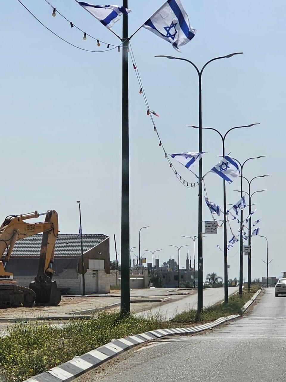 Israeli flags displayed throughout al-Sayed 