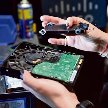 Concentration is necessary in dismantling classified hard drives