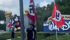 People displaying Nazi flags and symbols protest outside the entrance to Walt Disney World Resort in Orlando, Florida, U.S. June 10, 2023