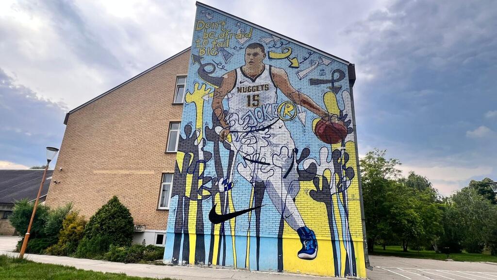 A mural of Jokić at the school he attended, in Sombor, Serbia 