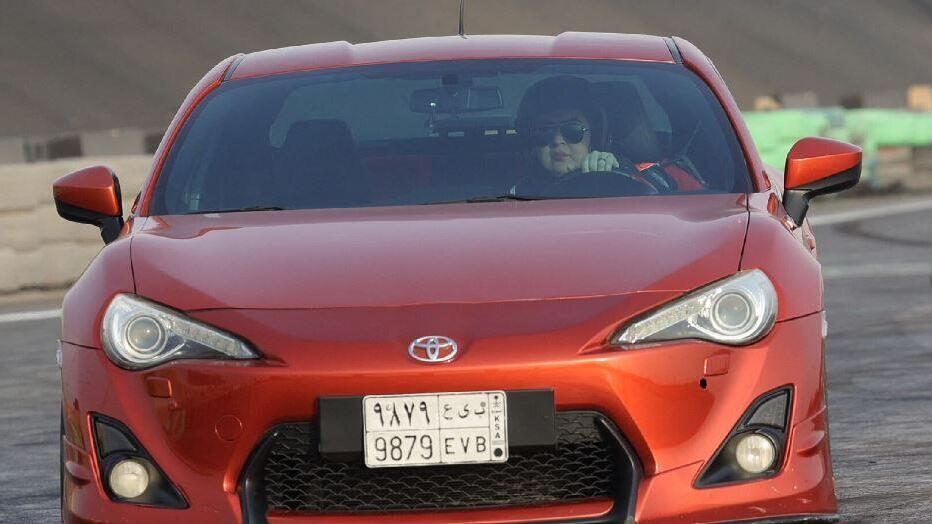 Afnan Almarglani, the first Saudi woman to be certified as an autocross instructor, drives her car at Derab circuit in the capital Riyadh on June 26, 2022.