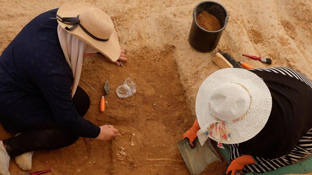 Palestinian engineers work in a Roman-era cemetery 