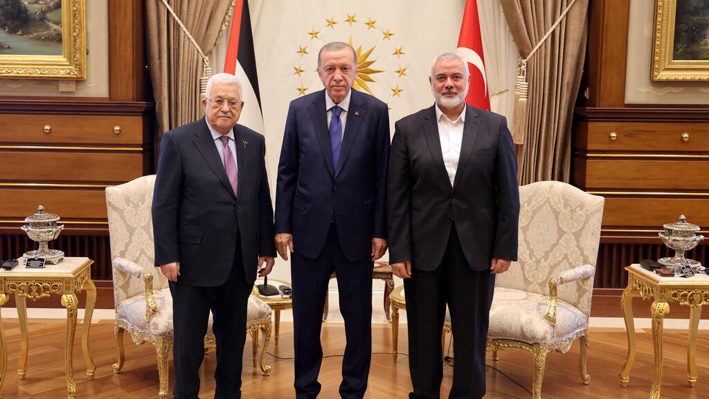 Palestinian Authority Chairman Mahmoud Abbas, Turkish President Recep Tayyip Erdoğan and Ismail Haniyeh meet in Ankara last July 