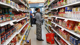 A woman shops in an Israeli supermarket 