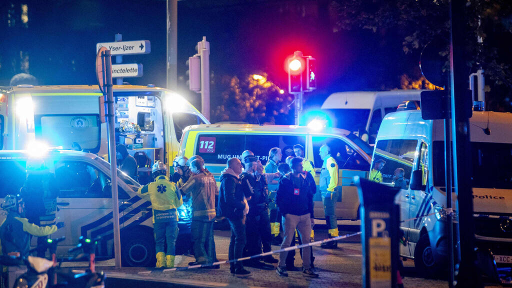 בלגיה בריסל חשד ל פיגוע נרצחו שני אוהדי נבחרת שבדיה