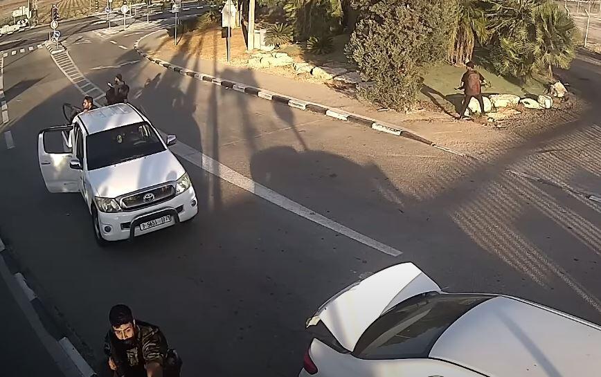 Image from video: Terrorists shoot at civilians cars  