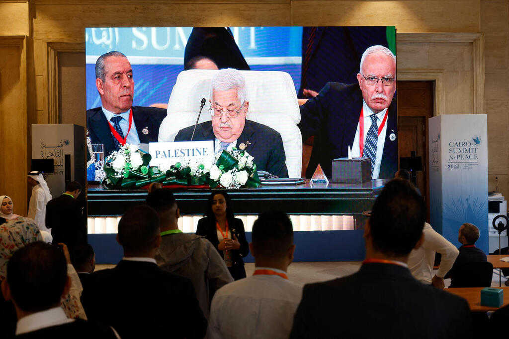 Palestinian president Mahmud Abbas attends the International Peace Summit