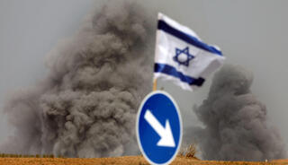 דגל ישראל בשדרות, ברקע תקיפות צה"ל ברצועה