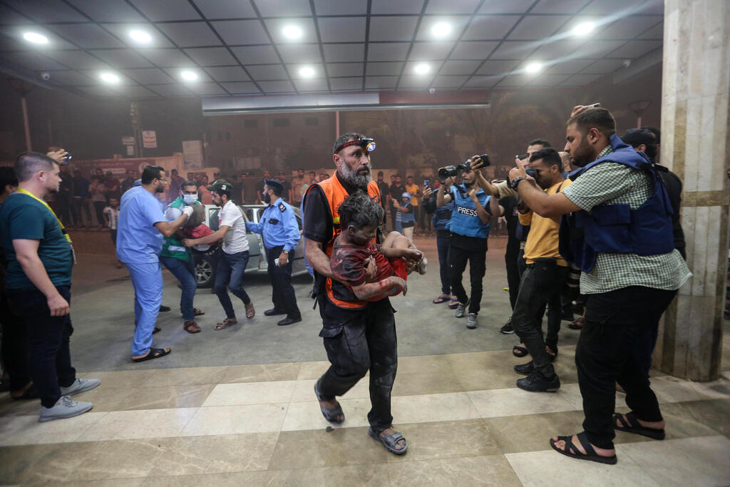 Injured in Israeli air raids arrive at Nasser Medical Hospital 