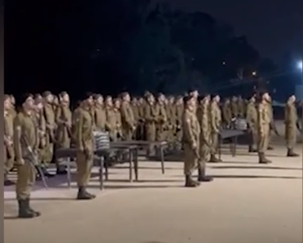 Haredi IDF recruits singing Israel's national anthem Hatikvah at basic training graduation ceremony