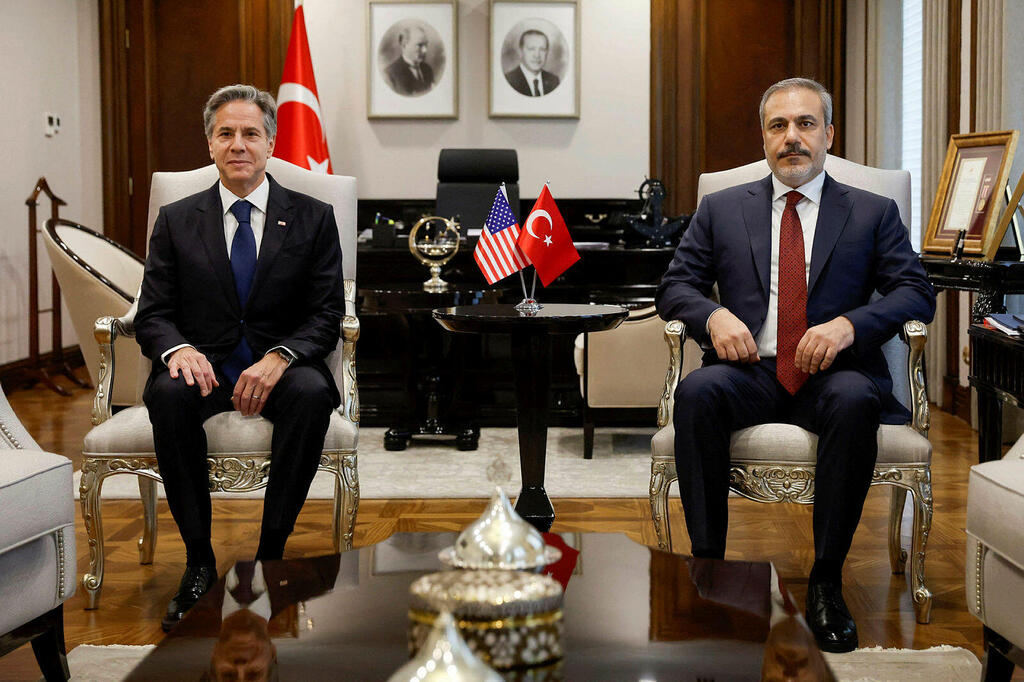 US Secretary of State Antony Blinken (L) poses for a photograph with Turkish Foreign Minister Hakan Fidan (R) after meetings with his Turkish counterparts at the Ministry of Foreign Affairs in Ankara, on November 6, 2023.