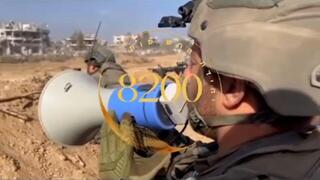 כתב זר תיעוד חייל צה"ל קורא לשיירות העזתים