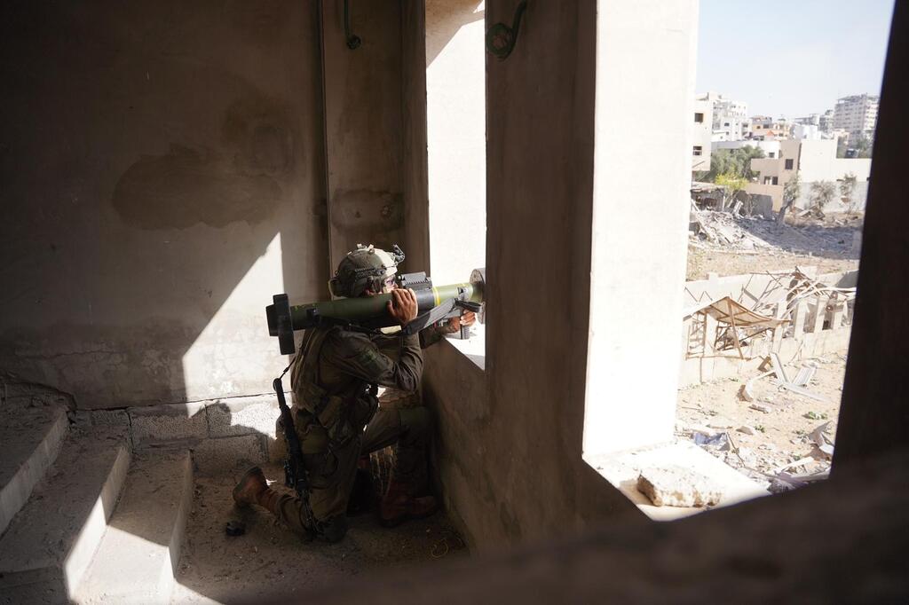 צילום: דובר צה"ל תיעוד מפעילות צוות הקרב החטיבתי של חטיבת הצנחנים בשכונת רימאל