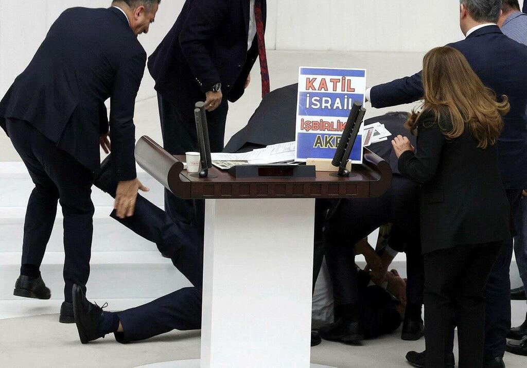 Deputy head of Turkey's Islamist Saadet (Felicity) Party Hasan Bitmez collapsed at the podium of the Turkish Parliament while he was criticizing the government's policy on Israel's war against Hamas in Gaza.  