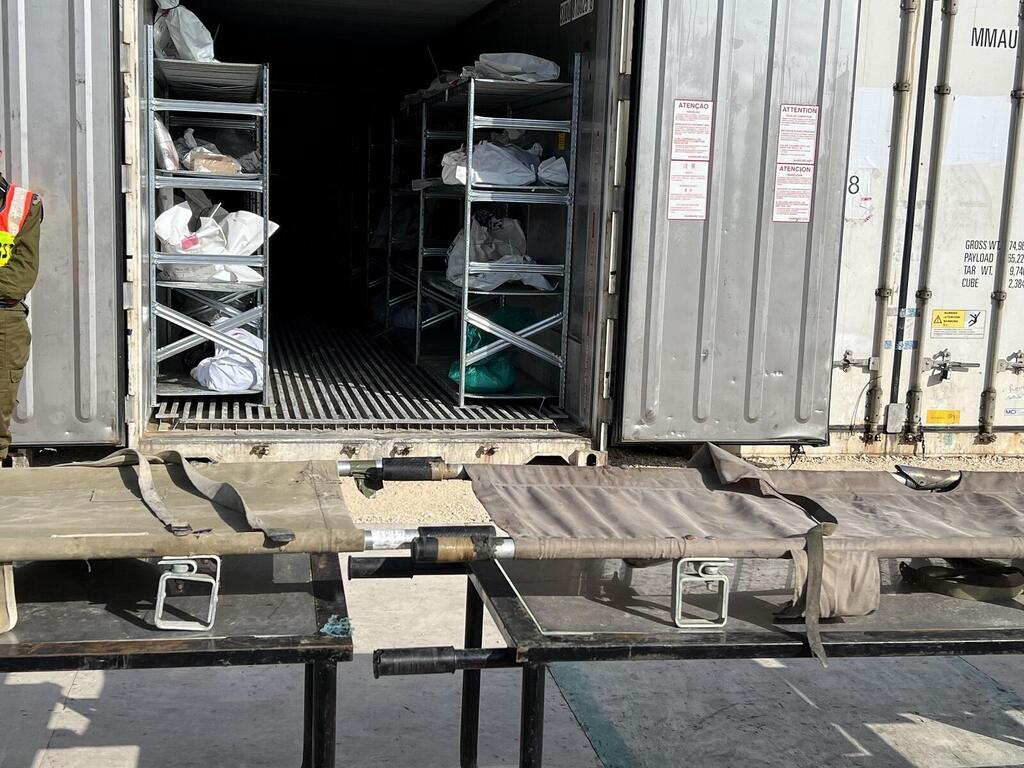 Unidentified bodies and body parts remain at the military morgue on the Shura Army Base near Ramla, Israel