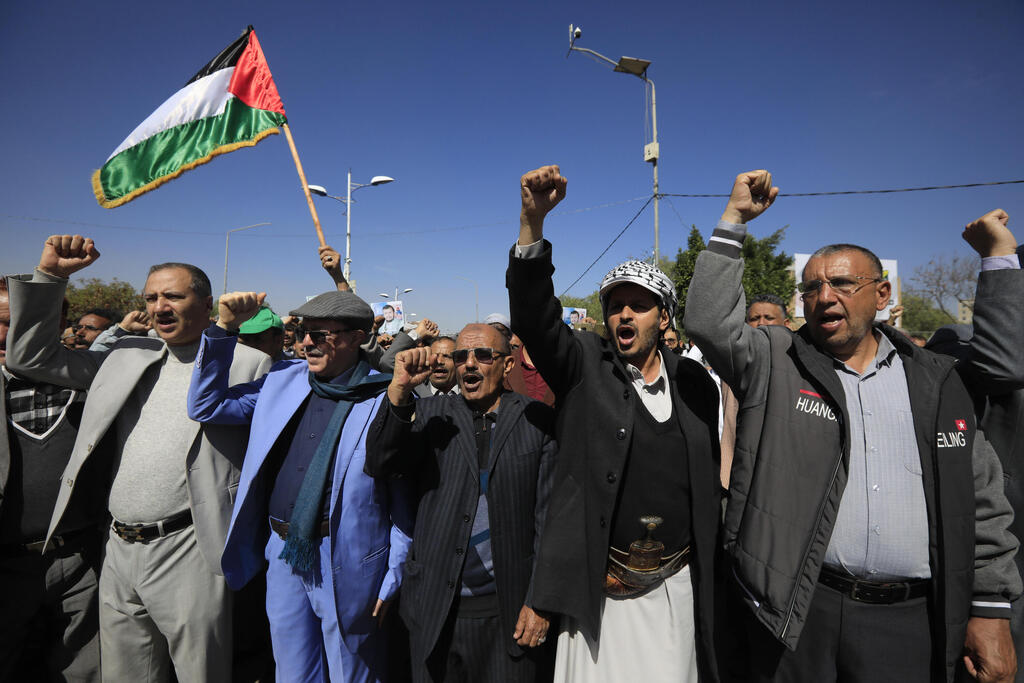 Protesters shout slogans during a protest in support of the Palestinian people, in Sana'a, Yemen on Wednesday 