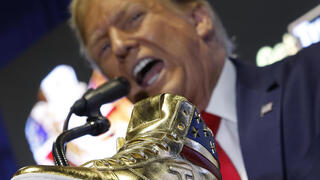 Donald Trump delivers remarks while introducing a new line of signature shoes at Sneaker Con