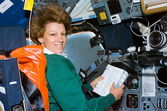 Successfully handled complex missions. Collins in the commander’s seat on the shuttle during her first mission as commander in 1999