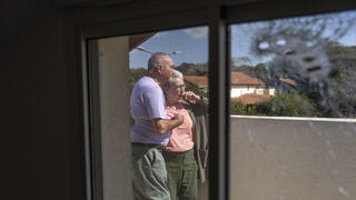 Pete and Gillian Brisley visit the home of their daughter, who was killed along with her two daughters in Hamas' Oct. 7 attack, and their son-in-law, who was taken captive, in Kibbutz Be'eri, southern Israel, Wednesday, Feb. 21, 2024 