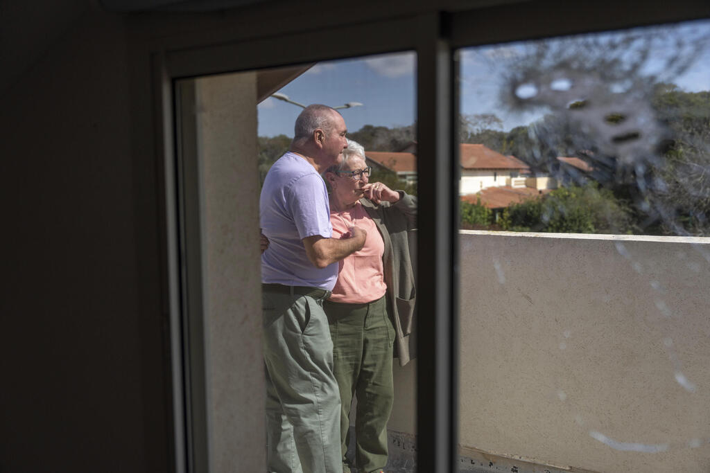 Pete and Gillian Brisley visit the home of their daughter, who was killed along with her two daughters in Hamas' Oct. 7 attack, and their son-in-law, who was taken captive, in Kibbutz Be'eri, southern Israel, Wednesday, Feb. 21, 2024 