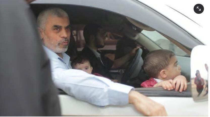 Hamas leader Yahya Sinwar with two of his children 