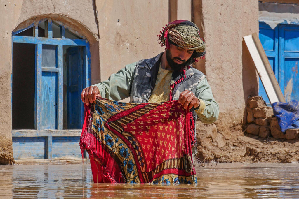 A house partially submerged in flood water following the flash floods in Afghanistan 