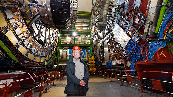 The only one to have predicted the existence of the additional scalar particle, which was later named after him. Peter Higgs at the ATLAS detector at CERN (Photo: CERN) היחיד שניבא את קיומו של החלקיק הסקלרי הנוסף, שלימים נקרא על שמו. פיטר היגס בגלאי אטלס, שחלק ממרכיביו פותחו בישראל