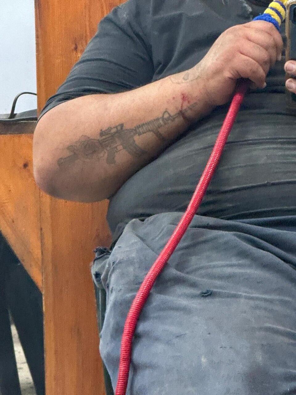 Close-up of the tattoo of one of the Arab customers at the hookah shop in the Arab part of the city of Lod 