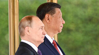 נשיא רוסיה ולדימיר פוטין לצד נשיא סין שי ג'ינפינג ב בייג'ינג