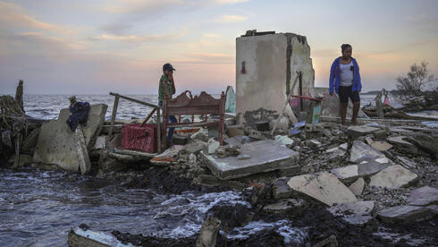 אחד הבתים ההרוסים בכפר המקסיקני אל בוסקה, כתוצאה מעליית פני הים