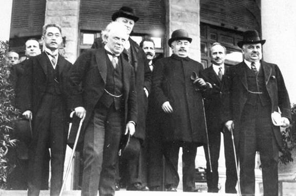 After the resolution on 25 April 1920, standing outside Villa Devachan, from left to right: Matsui, Lloyd George, Curzon, Berthelot, Millerand, Vittorio Scialoja, Nitti 