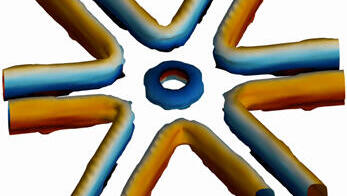 טבעת וקווי מערבולות שנוצרים בהשפעה ההדדית בין שלושה פוטונים. הצבע מתאר את הפאזה של השדה החשמלי, שעושה סיבוב שלם (360 מעלות) סביב המערבולת