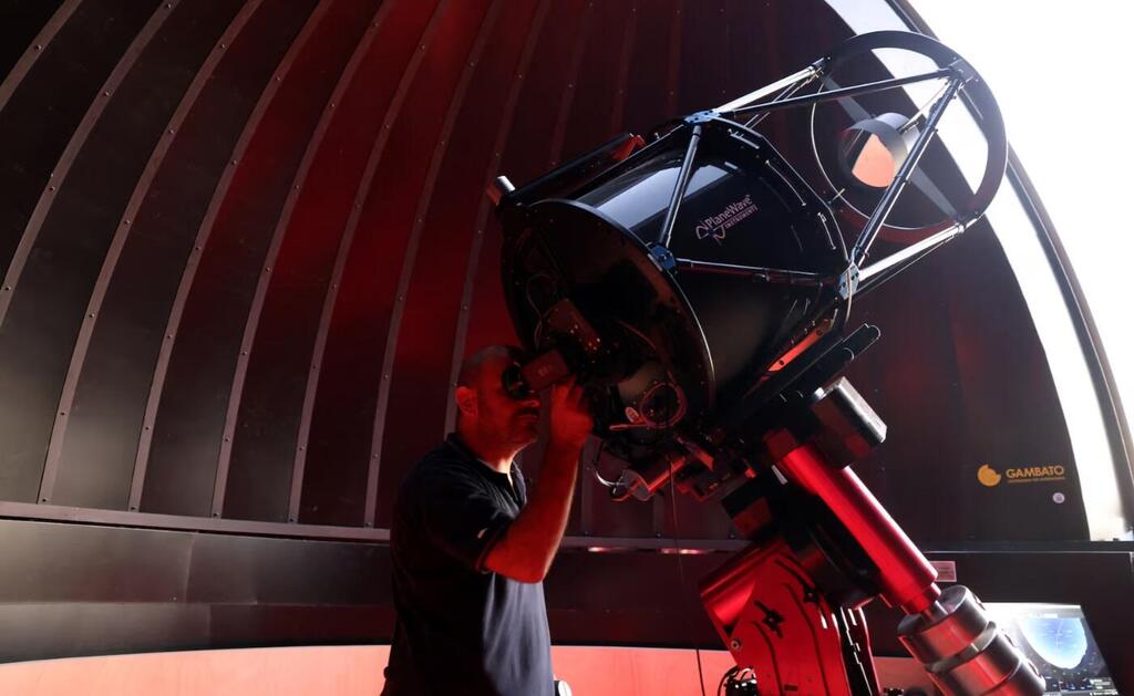  Astronomer Agapios Elia uses a telescope in Troodos astronomical observatory 