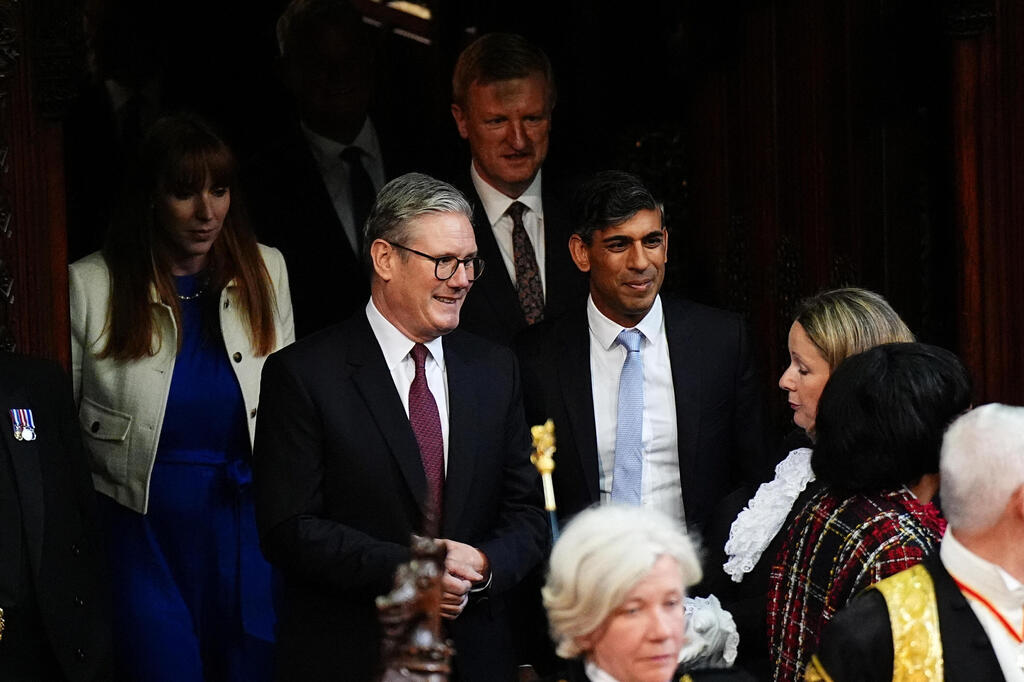 Prime Minister Sir Keir Starmer and former prime Minister Rishi Sunak arrive in the chamber ahead of the King's Speech