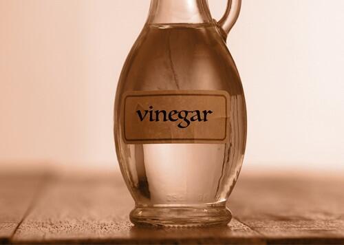 Inexpensive, versatile in the kitchen, and effective as a cleaning agent and scale remover due to its acidity. Vinegar 