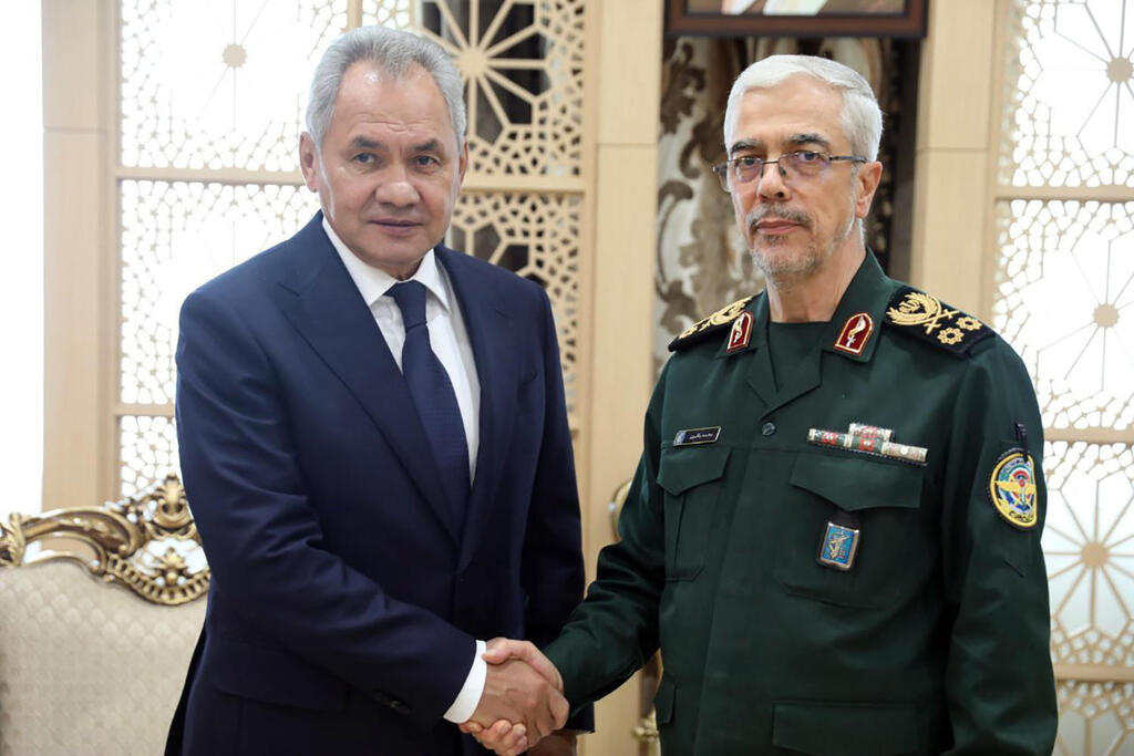 Russian Security Council Secretary Sergei Shoigu with Iranian Armed Forces General Mohammad Bagheri  