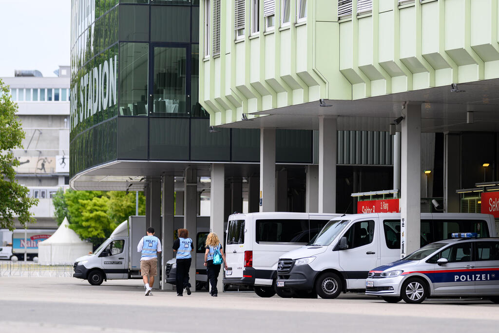 Police vehicles outside the Happel stadium after a Taylor Swift concert was cancelled amid a threat of an ISIS attack 