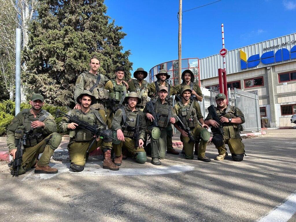 Cooper (second from right) on reserve duty 