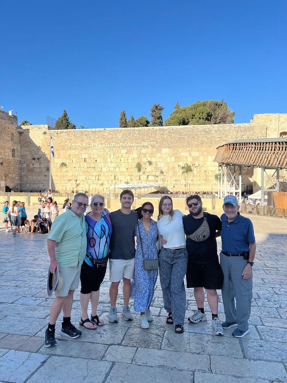 Cooper (second from right) and his family at the Western Wall 