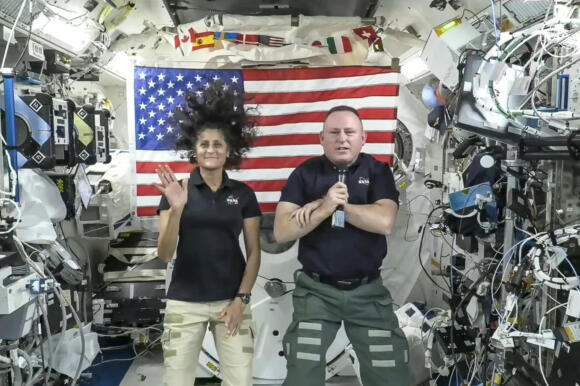Extended mission - Came for eight days, have been waiting for two months, and might only return after eight months. Astronauts Wilmore and Williams at the space station last month 