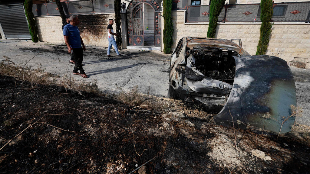 Aftermath of an attack by Jewish settlers on a Palestinian West Bank village (Photo: Jaafar Ashtiyeh / AFP) מתנחלים מתפרעים בכפר ג'ית