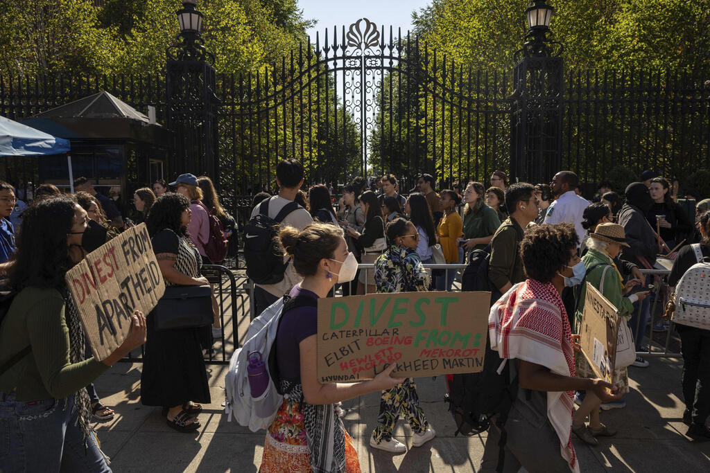 Pro-Palestinian supporters hold a picket line outside Columbia University, Tuesday, Sep. 3, 2024, in New York