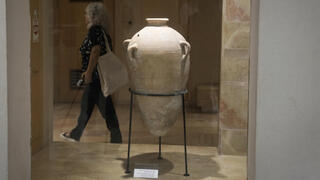 A rare bronze-era jar, newly reassembled, returned to public exhibition at Haifa's Hecht Museum after it was accidentally broken by a 4-year-old visitor