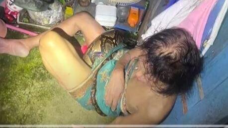 Python traps Thai woman for hours 