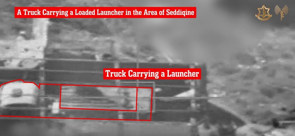 Truck carrying a loaded launcher in the area of the village of Seddiqine