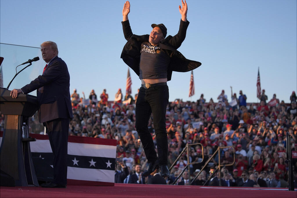 Elon Musk at a Donald Trump election rally 