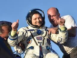 Oleg Kononenko exits the Soyuz spacecraft after landing in Kazakhstan  