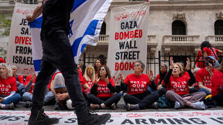 Protesters and counter-protestors against Israel's war in Gaza outside the New York Stock Exchange in New York City