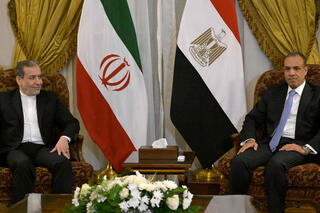Egypt's Foreign Minister Badr Abdelatty (R) meets with Iran's  Abbas Araghchi  